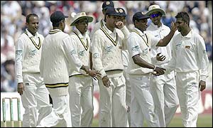 Sri Lanka's players congregate