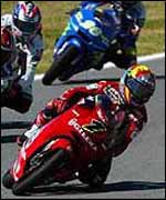 Manuel Poggiali overtaking Pablo Nieto