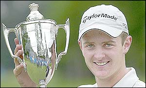 Justin Rose lifts the British Masters trophy
