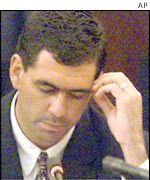 Cronje reading his submission to the King Commission