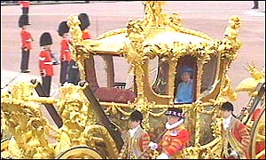 Duke of Edinburgh and Queen in gold state coach