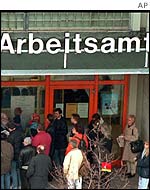 People queue outside German job centre