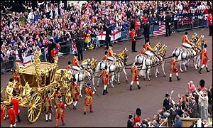 Thronged crowds watch the procession