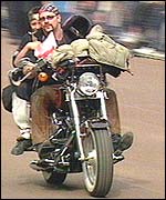 Alan Fisher, known as Snob, leads the bikers