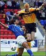 Nathan Lowndes (right) in action for Livingston