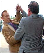 Kenyon being attacked by a trainer after being confronted with evidence that he had fixed races