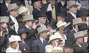 Racegoers take in the atmosphere during the big race at Epsom