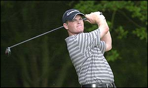 Drysdale of Scotland misses the fairway on his way to a double-bogey six at the first