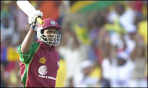 Shivnarine Chanderpaul of the West Indies salutes the crowd on his century