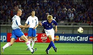Japan's Junichi Inamoto scores the winning goal