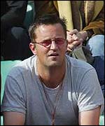 Actor Matthew Perry watches the men's semi-finals at the French Open
