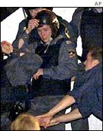 Russian police confront hooligans