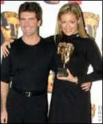 Simon Cowell and Cat Deeley