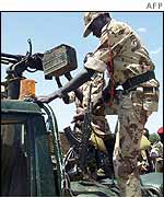 Car and machine gun left behind by government troops