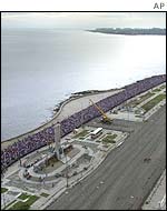 Marchers along Havana seafront