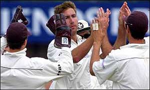Giddins is congratulated by his teammates