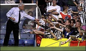 Bobby Robson signs autographs for Newcastle fans