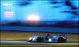 The Audi Sport number one car roars round Le Mans