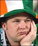 Dejected fan after Irish team's exit