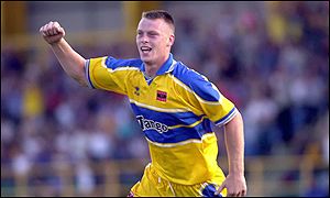 Mike Flynn celebrates scoring against FC Porto