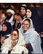 Delegates listen to Karzai speak