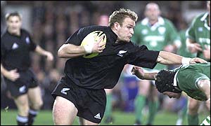 Prop Scott Robertson on the run against Ireland