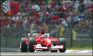 Ferrari's Michael Schumacher pays the price for a mistake on his final qualifying lap and will start the race from third on the grid