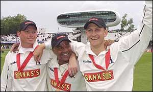 Ian Bell and Jim Troughton celebrate their win