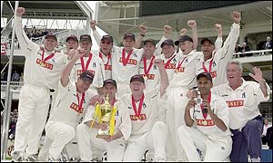 Warwickshire celebrate with the trophy 