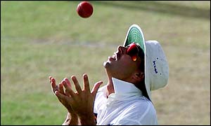 Stephen Fleming catches a wayward shot from Windies batsman Merv Dillon