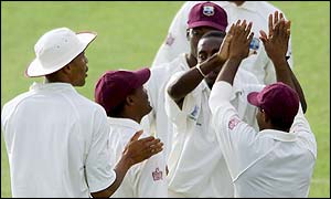 Windies players celebrate the dismissal of New Zealand's Mark Richardson