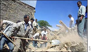 Villagers dig for survivors