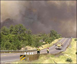 Smoke blows across a main highway