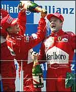 Michael Schumacher and Rubens Barrichello on the podium in Austria
