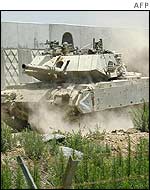 Israeli tank infront of West Bank fence