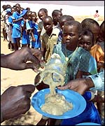 Children queuing for food aid