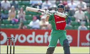 Robert Croft crashes another shot to the boundary against England