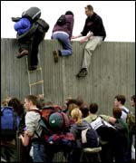Fans breach the fence