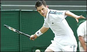 Tim Henman Hits a forehand to French opponent Jean-Francois Bachelot