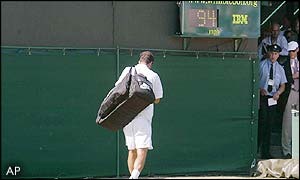 Sampras walks off the court at Wimbledon for the last time this year