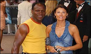 Chris and Karron Eubank pose for photographers