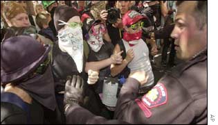 Protesters engage in a shoving match with police in Calgary