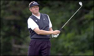 Monty keeps an eye on his drive down the fairway