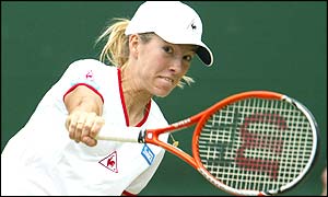 Justine Henin moves into the third round with little difficulty