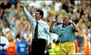 O'Leary celebrates taking the club into the Champions League with assistant boss Eddie Gray