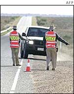 Australian police search vehicles