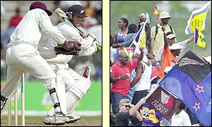 A New Zealand fan cheers as Nathan Astle records a score of 69 not out at the close of the first day's play