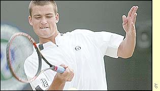 Mikhail Youzhny plays a winning forehand