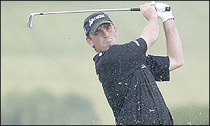 Thomas Bjorn tees off at the seventh hole