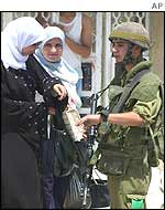 Palestinian women at an Israeli checkpoint